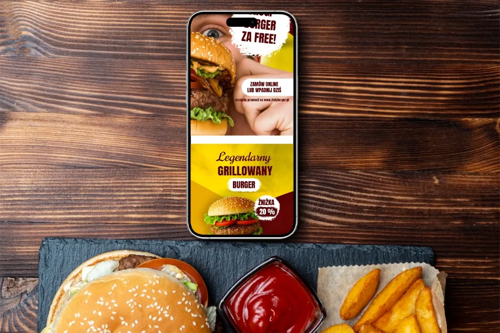 Projekt grafik social media Złoty Burger - podgląd materiałów na ekranie telefonu